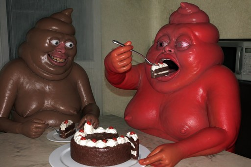Two colorful clay figures share a cake at a table in a humorous scene.